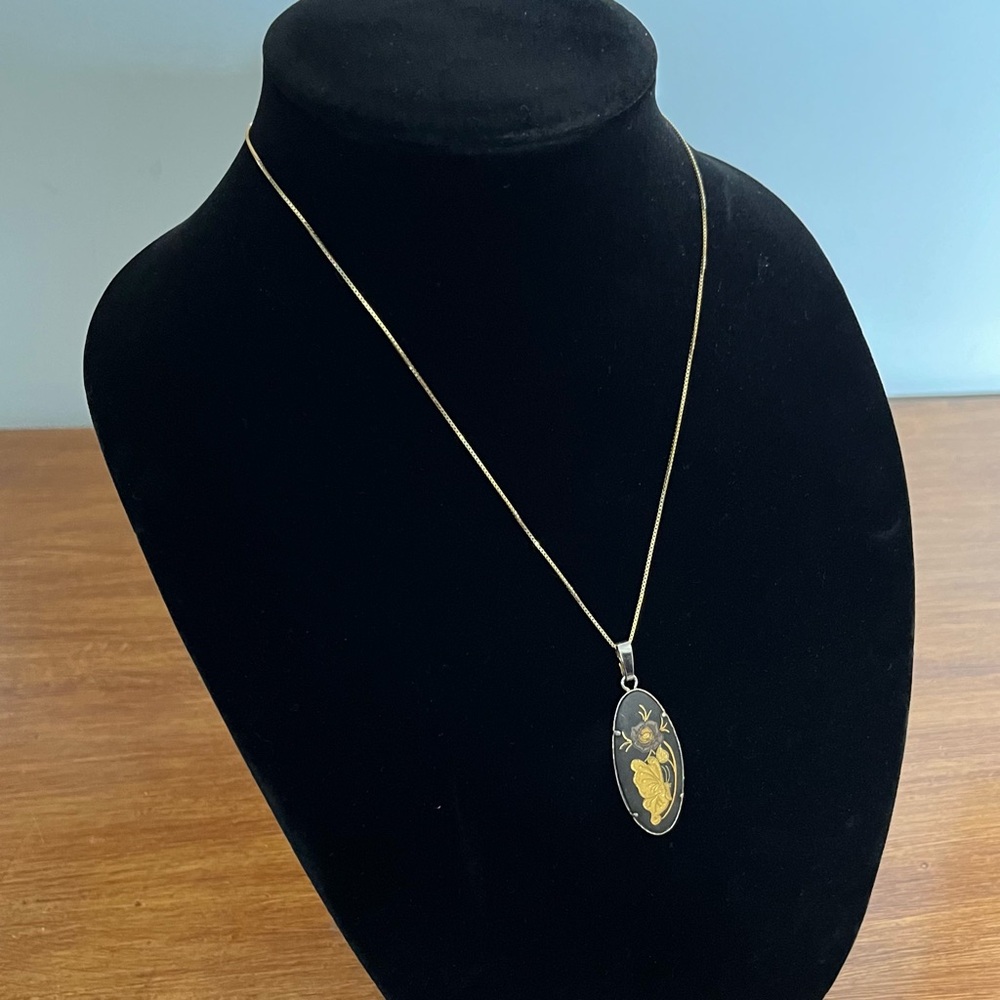 Vintage black and gold pendant necklace
